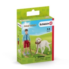 Schleich - Spacer z psem rasy Labrador Retriever 42478